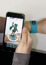 Load image into Gallery viewer, WRIST WORLD Hatsune Miku Hologram Wrist Band - an Augmented Reality Virtual AR RPG Adventure On Your Phone and Wrist
